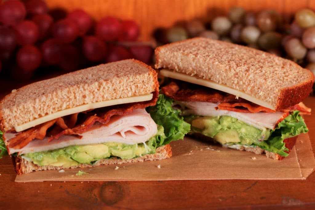The McKinley sandwich — turkey, avocado, Swiss on honey whole wheat